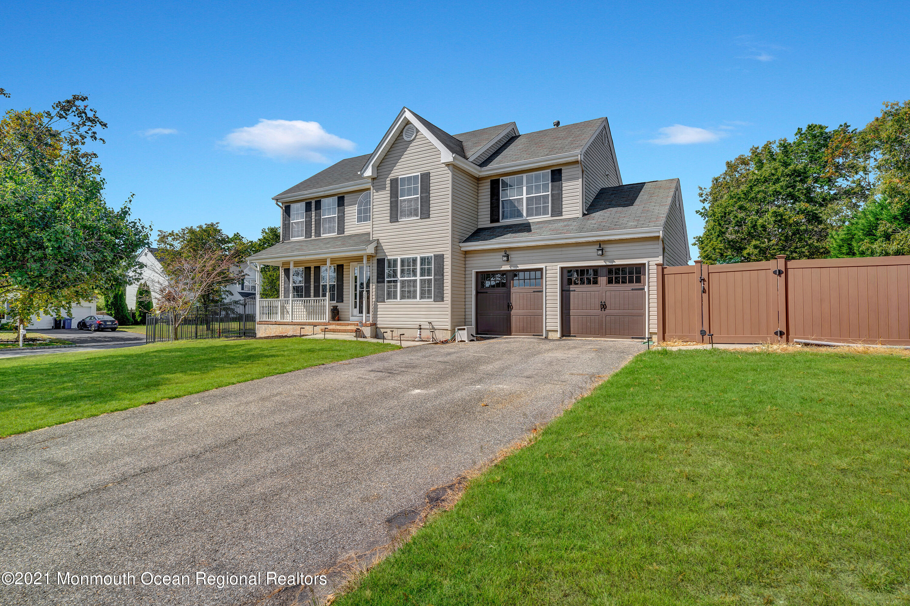 101 Longboat Road Manahawkin, NJ 08050 - Photo 46 of 47 a front view of house with yard and green space