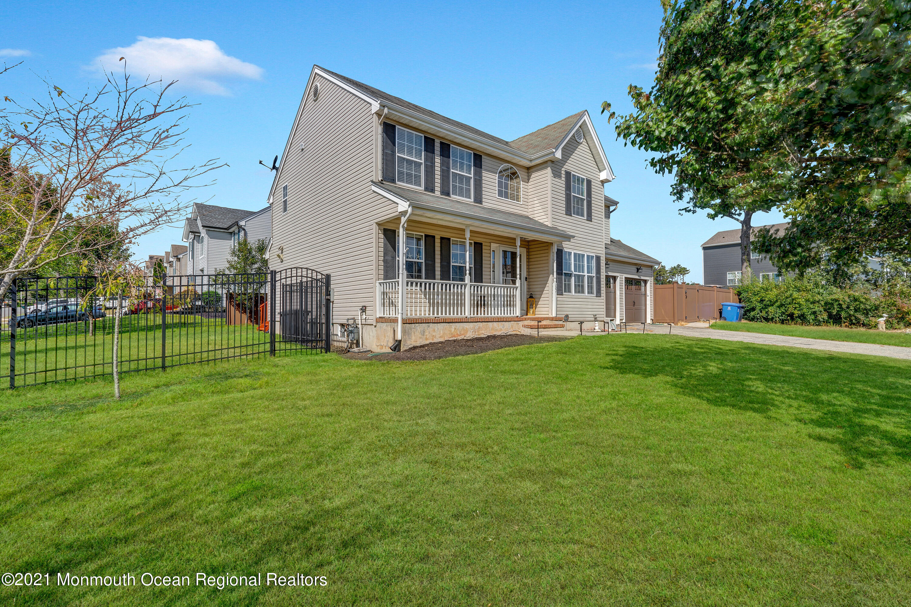 101 Longboat Road Manahawkin, NJ 08050 - Photo 47 of 47 a front view of a house with a yard