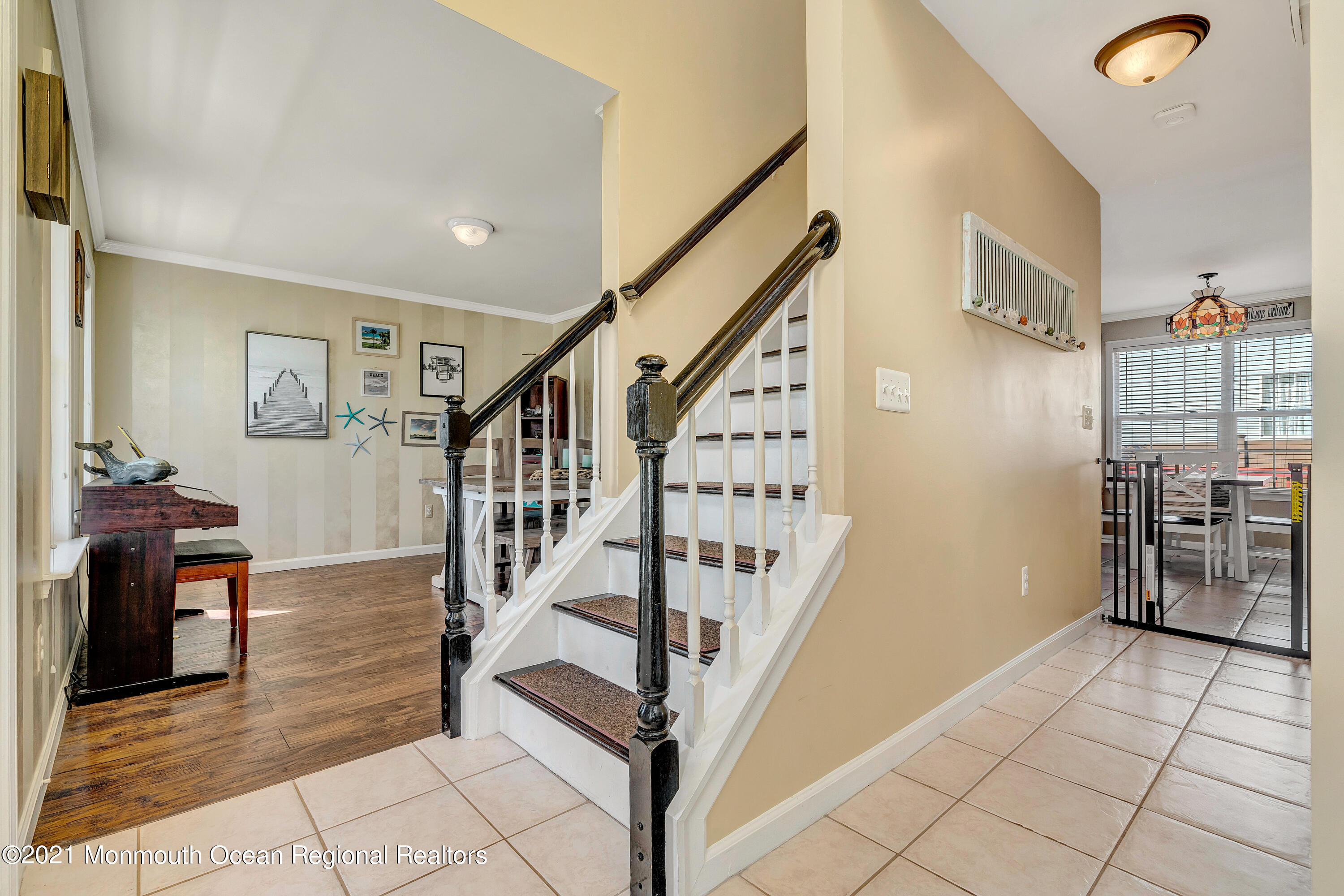 101 Longboat Road Manahawkin, NJ 08050 - Photo 6 of 47 a view of entryway and hall with dining room