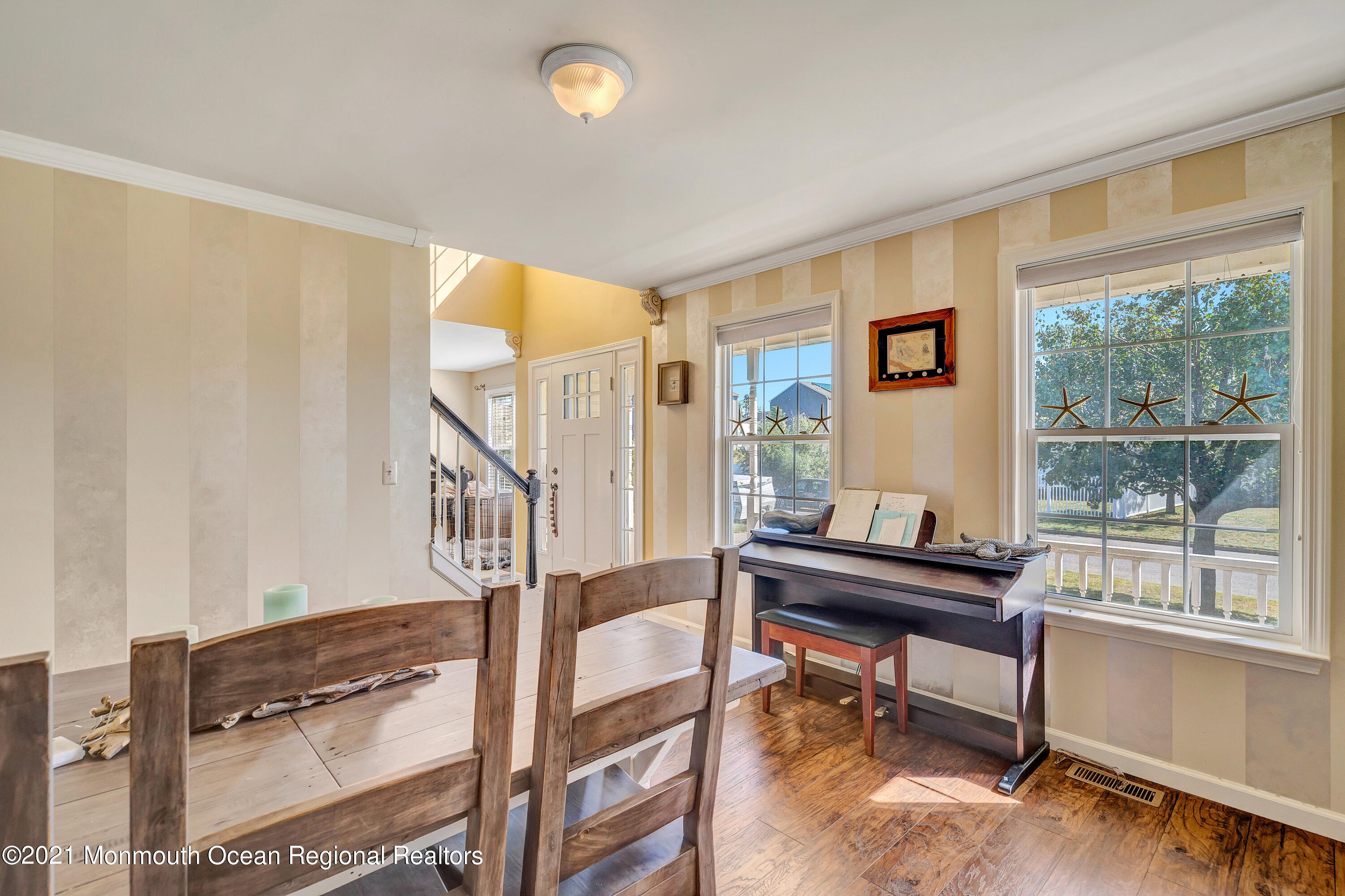 101 Longboat Road Manahawkin, NJ 08050 - Photo 8 of 47 a view of a livingroom with furniture and a window