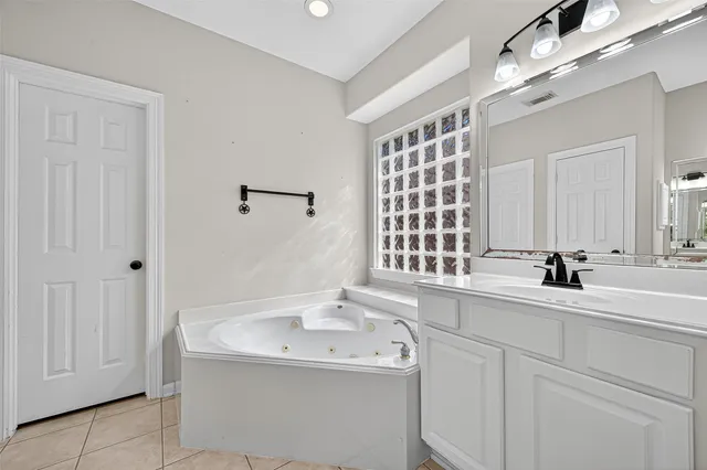 a bathroom with a sink and a bathtub