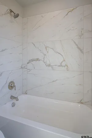 a bathroom with a bathtub