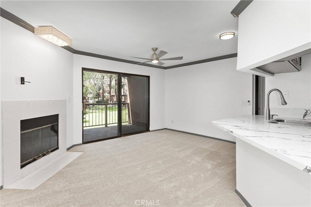 10655 Lemon Avenue, Unit 3609 Rancho Cucamonga, CA 91737 - Photo 5 of 33 Living room with fireplace