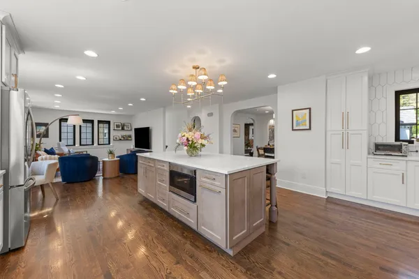 a view of livingroom with furniture and wooden floor