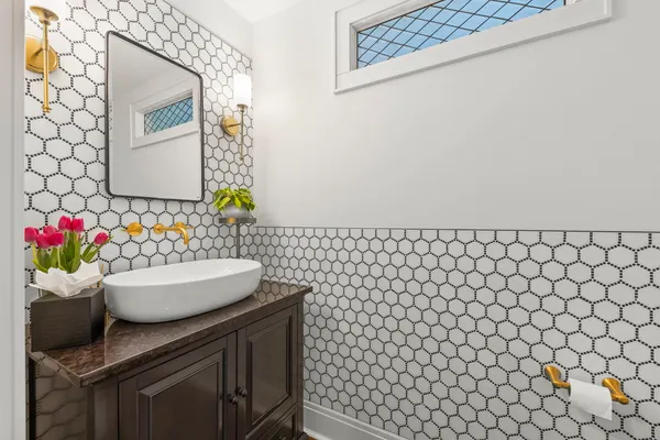 a bathroom with a bathtub and sink
