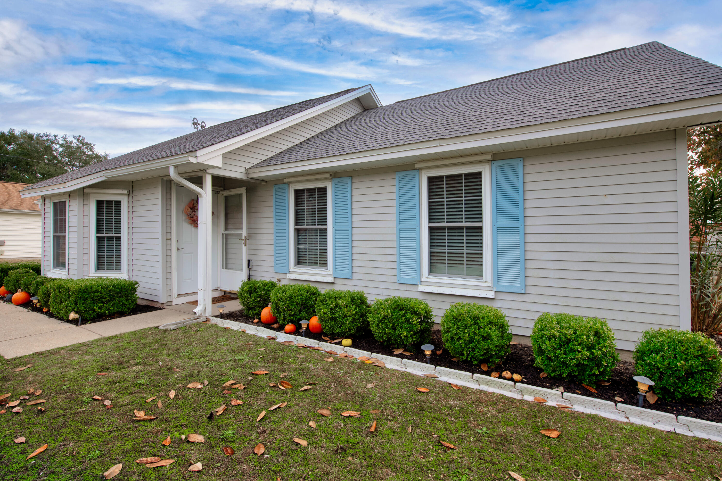 400 Brown Place Crestview, FL 32539 - Photo 2 of 24 a front view of a house with a yard