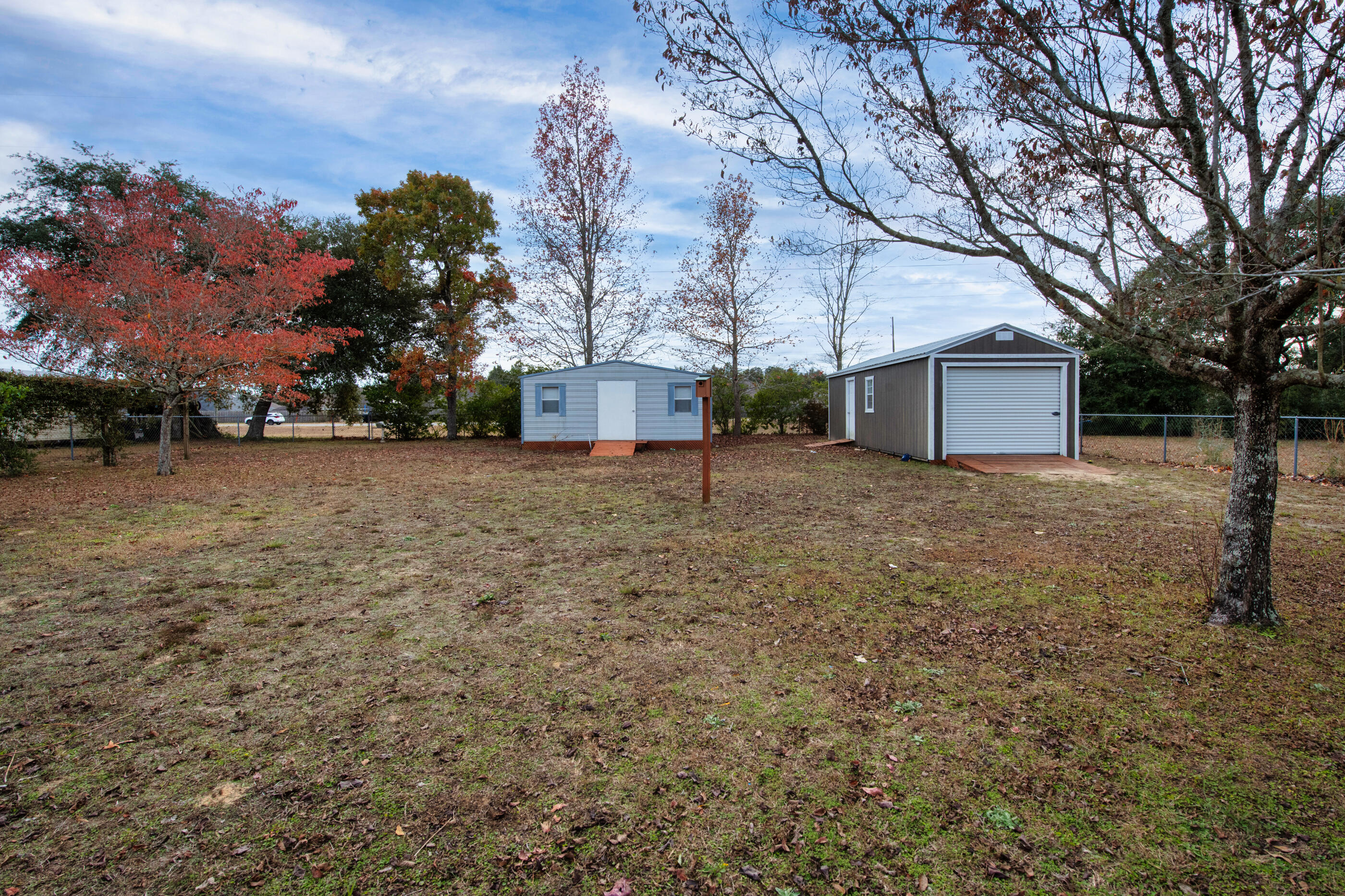 400 Brown Place Crestview, FL 32539 - Photo 21 of 24 front view of a house with a yard