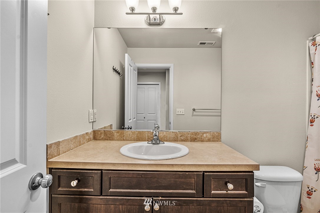 3627 202nd Pl S East Bothell, WA 98012 - Photo 22 of 38 a bathroom with a sink and a toilet
