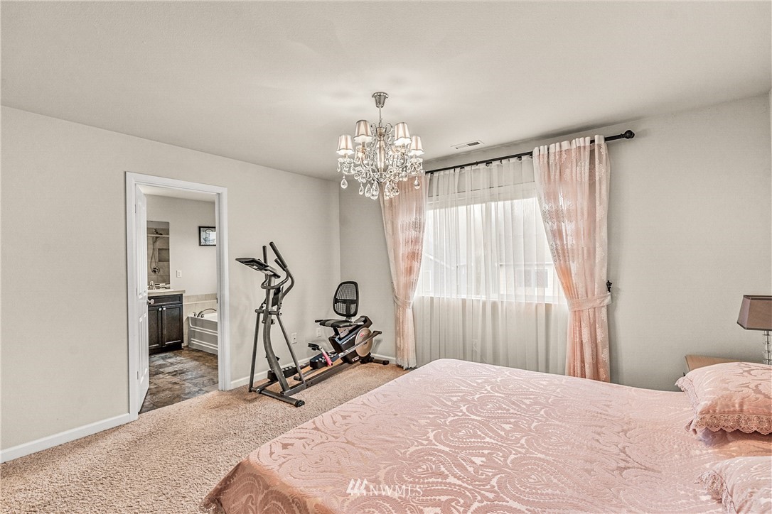 3627 202nd Pl S East Bothell, WA 98012 - Photo 28 of 38 a view of a room with gym equipment
