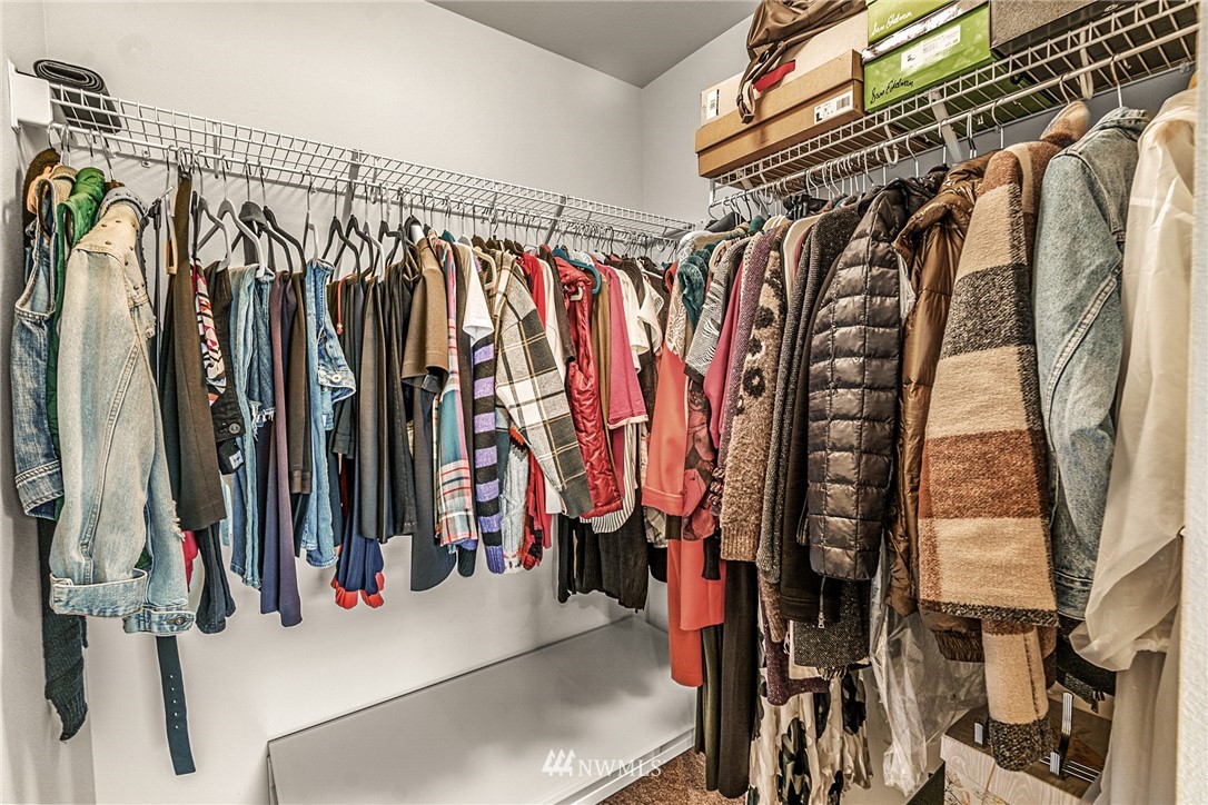 3627 202nd Pl S East Bothell, WA 98012 - Photo 32 of 38 a view of walk in closet with clothes