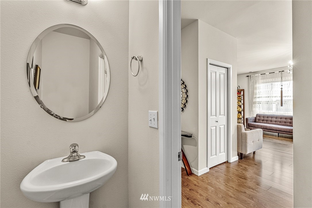 3627 202nd Pl S East Bothell, WA 98012 - Photo 7 of 38 a bathroom with a sink and a mirror