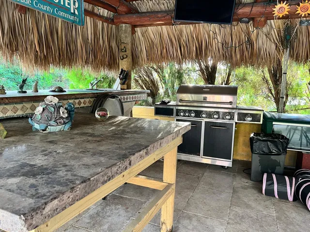a kitchen with a stove and a table