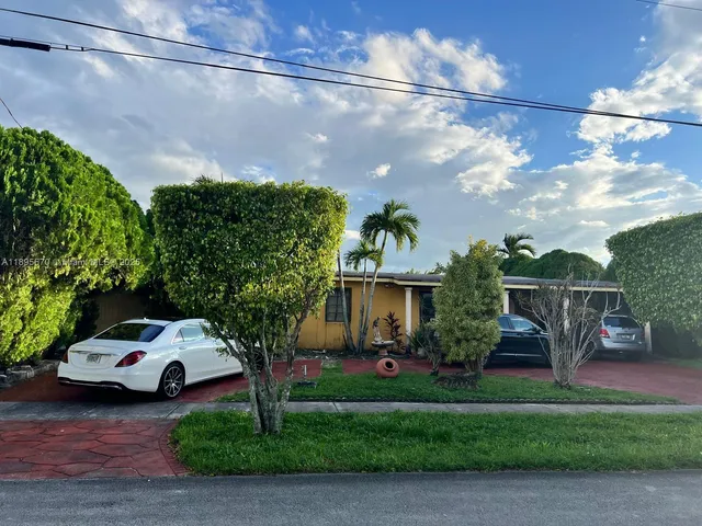 a view of a car in front of house