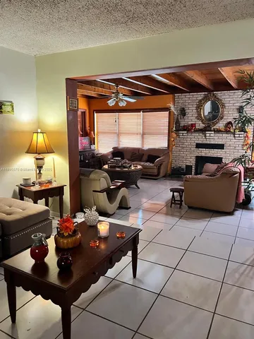 a view of a workspace with furniture