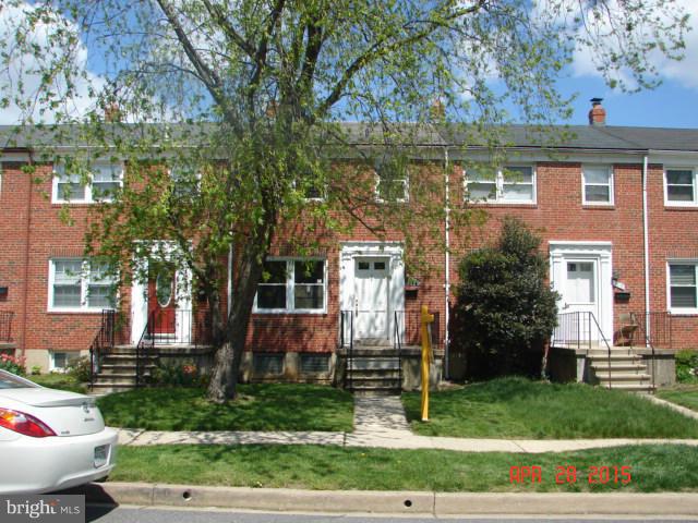 1221 Harwall Road Baltimore, MD 21207 - Photo 1 of 10 front view of house with a yard