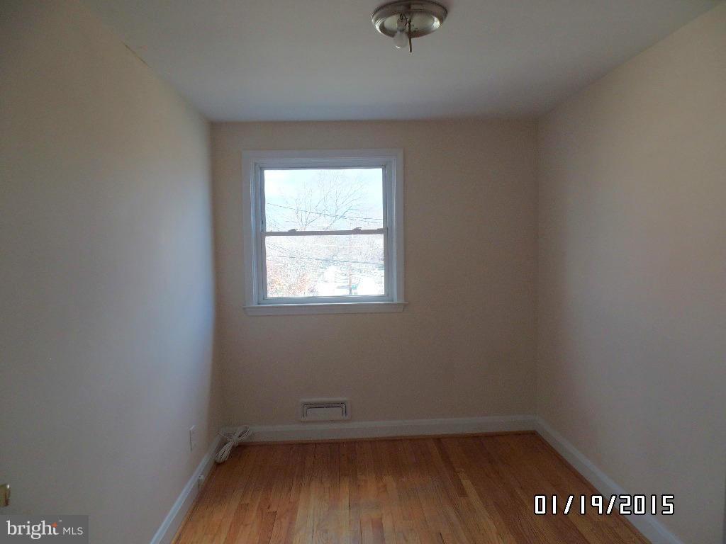 1221 Harwall Road Baltimore, MD 21207 - Photo 5 of 10 a view of a room that has wooden floor