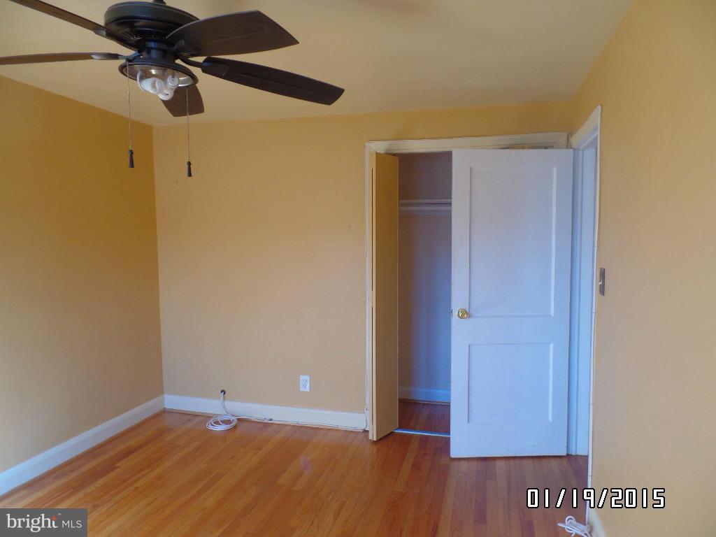 1221 Harwall Road Baltimore, MD 21207 - Photo 7 of 10 a view of room with a ceiling fan
