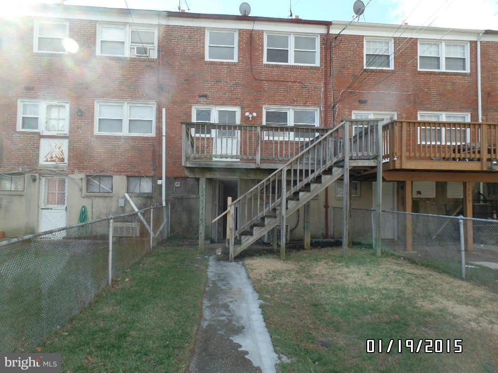 1221 Harwall Road Baltimore, MD 21207 - Photo 10 of 10 a view of front of house with a yard