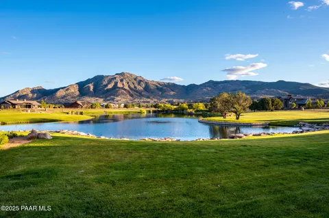 a view of a lake with a mountain in the background
