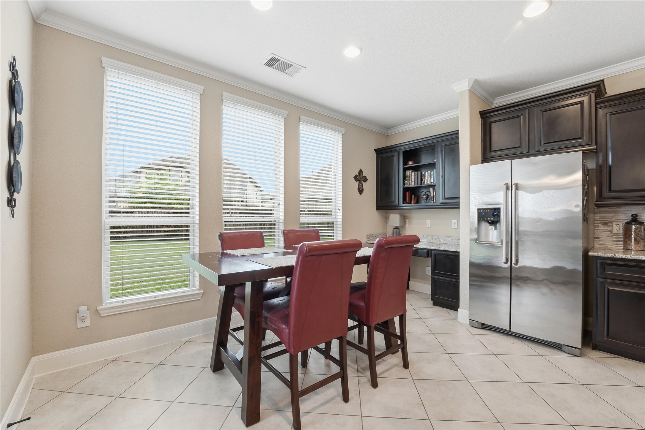 12506 Northpointe Ridge Lane Tomball, TX 77377 - Photo 10 of 31 a dining room with furniture and large window
