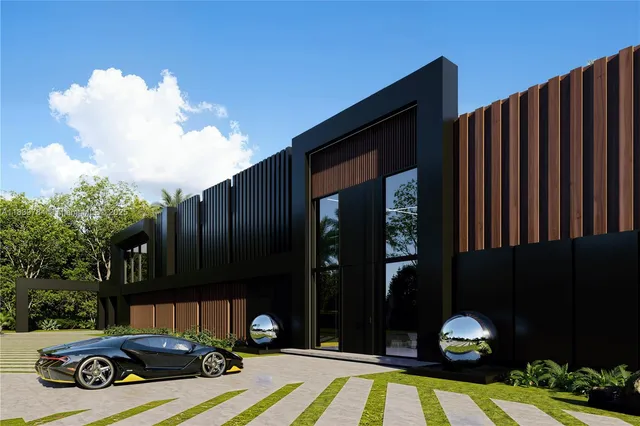 a view of a car park in front of a house