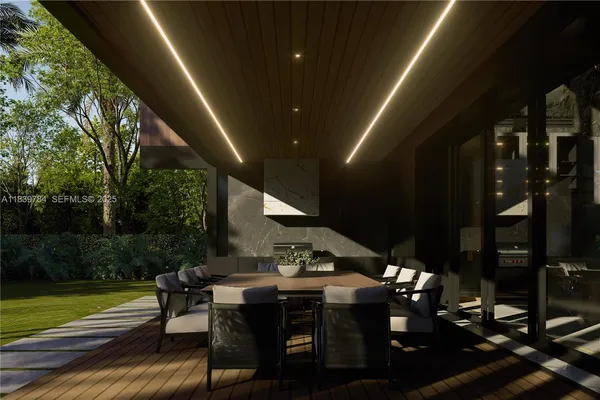 a view of a house with swimming pool and sitting area