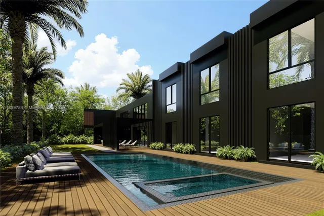 a swimming pool with outdoor seating and yard