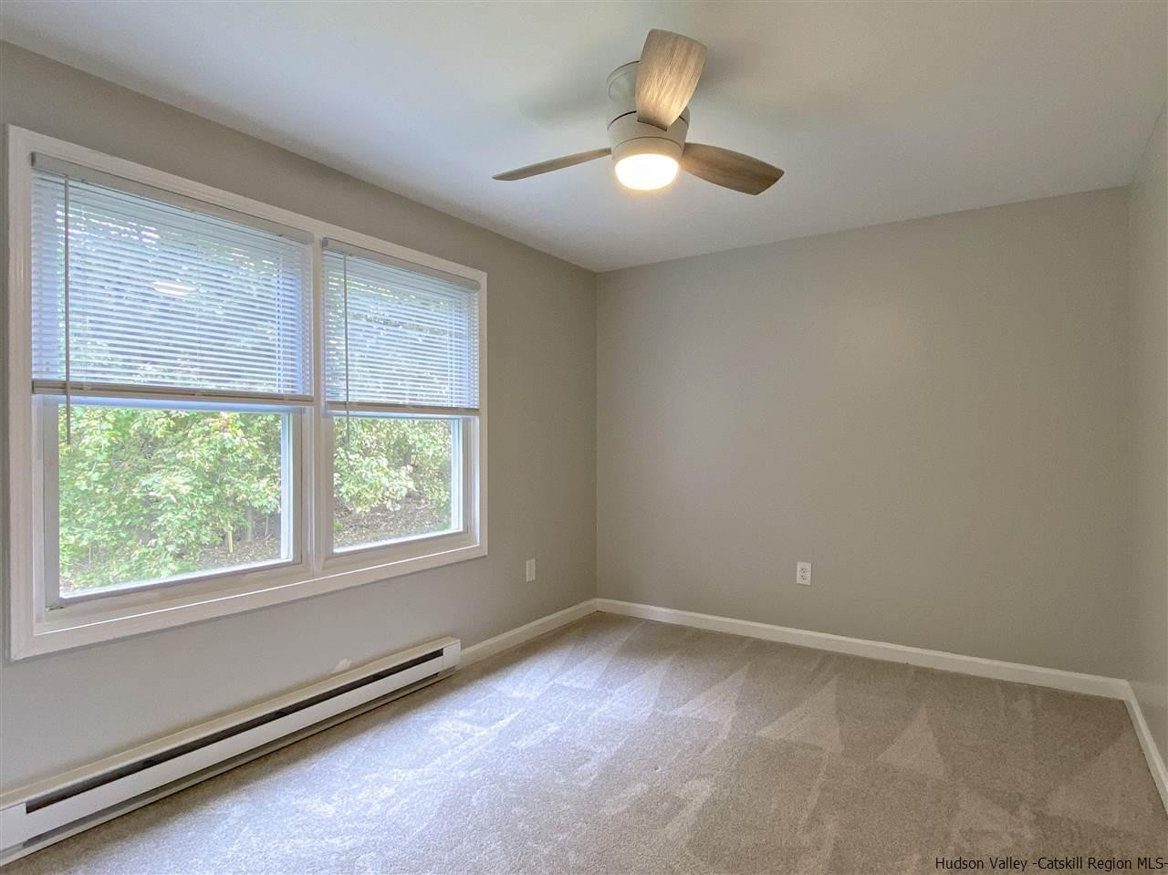 96 Rinaldi Boulevard Poughkeepsie, NY 12601 - Photo 12 of 23 an empty room with a window