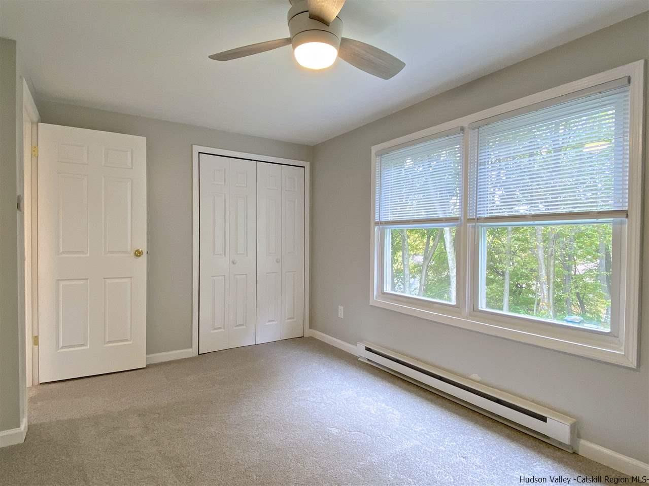 96 Rinaldi Boulevard Poughkeepsie, NY 12601 - Photo 13 of 23 a view of an empty room with a window