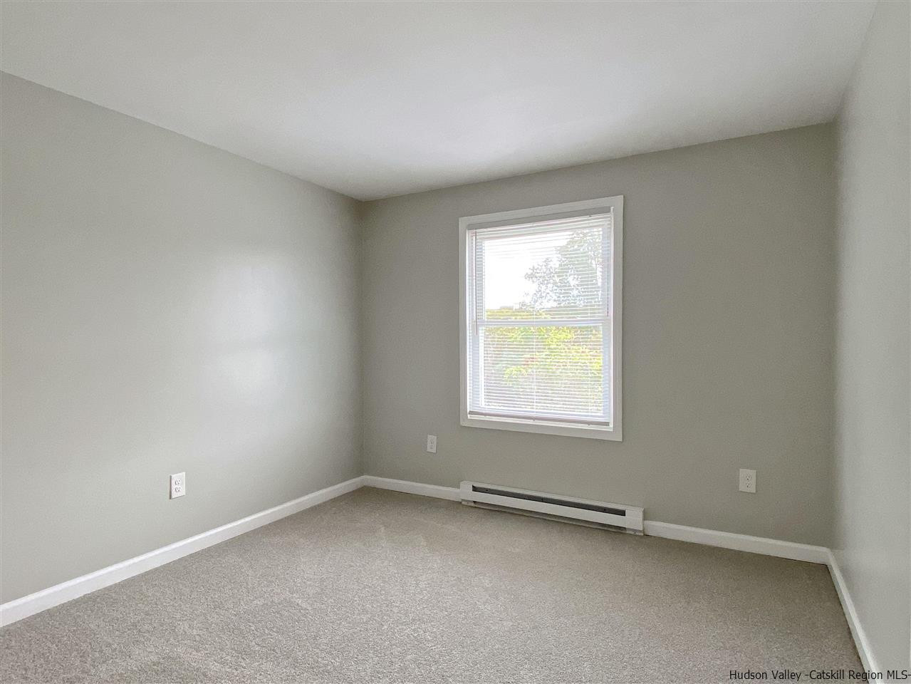 96 Rinaldi Boulevard Poughkeepsie, NY 12601 - Photo 18 of 23 an empty room with a window