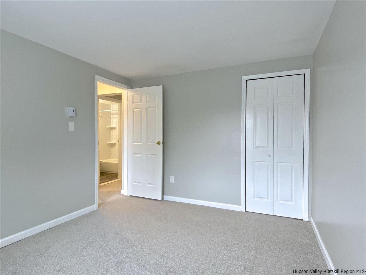 96 Rinaldi Boulevard Poughkeepsie, NY 12601 - Photo 19 of 23 a view of an empty room and closet area