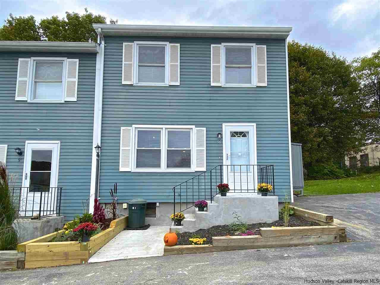 96 Rinaldi Boulevard Poughkeepsie, NY 12601 - Photo 2 of 23 a front view of a house with a yard