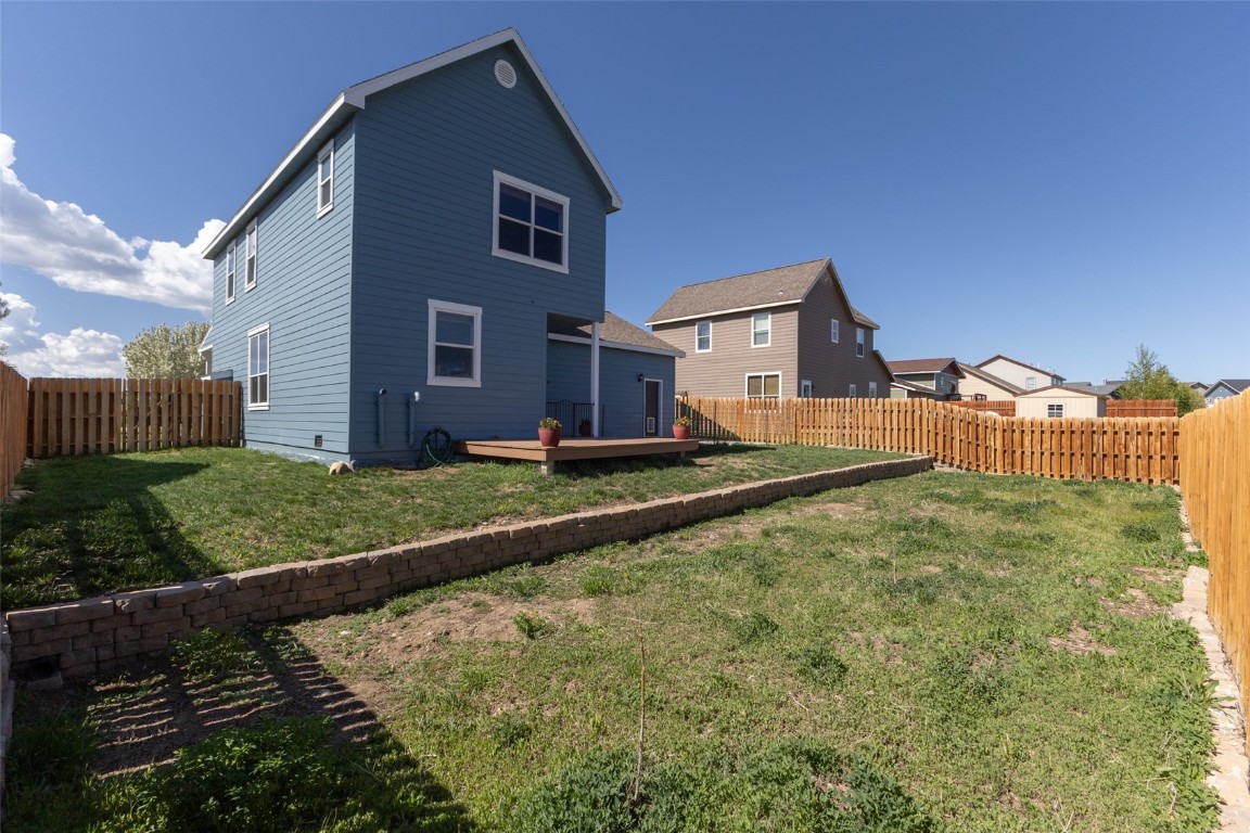 324 Little Bend Road Hayden, CO 81639 - Photo 14 of 35 a front view of a house with a yard