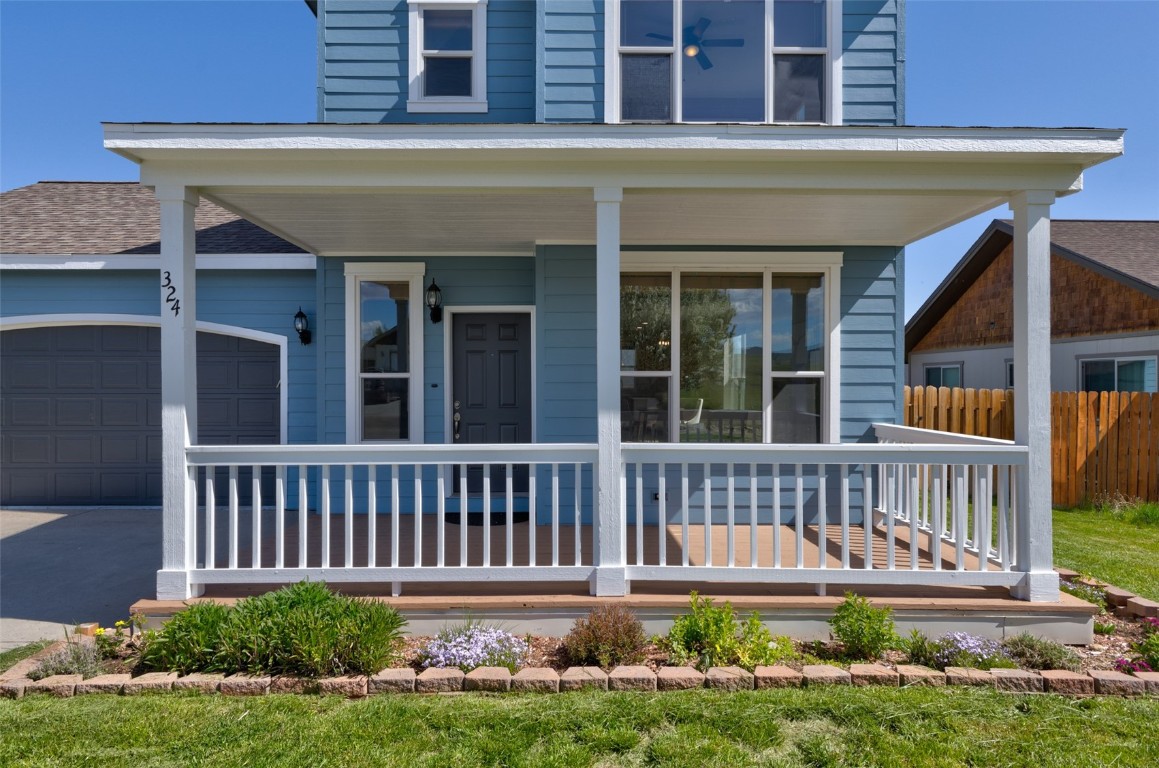 324 Little Bend Road Hayden, CO 81639 - Photo 2 of 35 a front view of a house with a yard