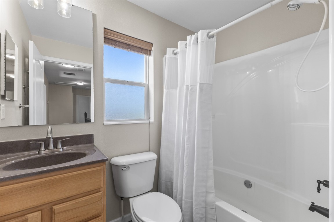 324 Little Bend Road Hayden, CO 81639 - Photo 26 of 35 a bathroom with a granite countertop sink toilet and shower