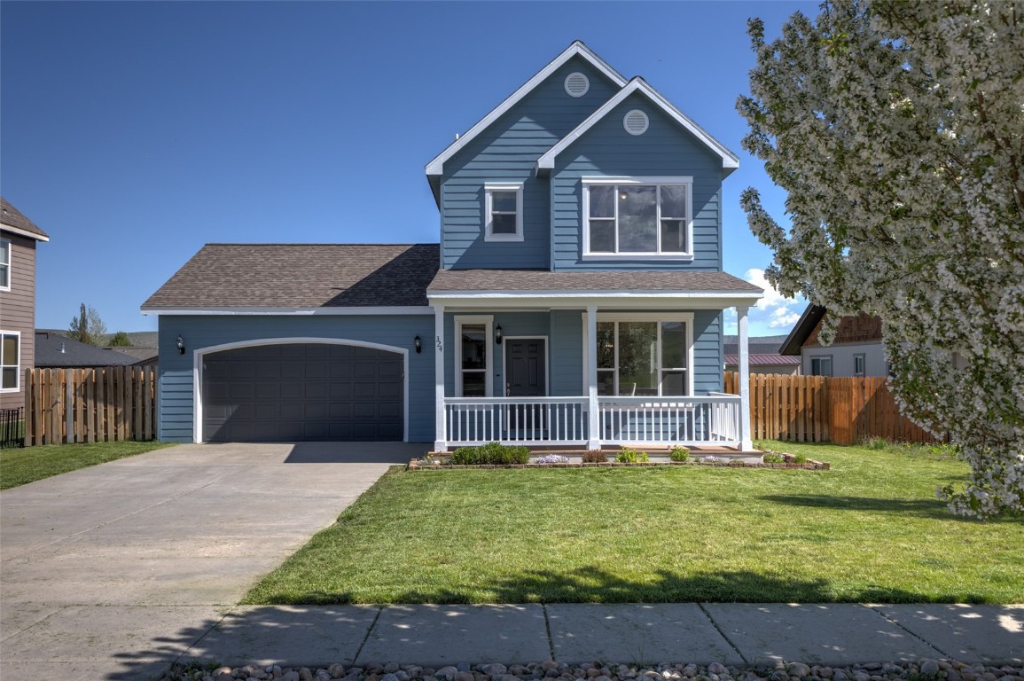 324 Little Bend Road Hayden, CO 81639 - Photo 31 of 35 a front view of a house with a yard and garage