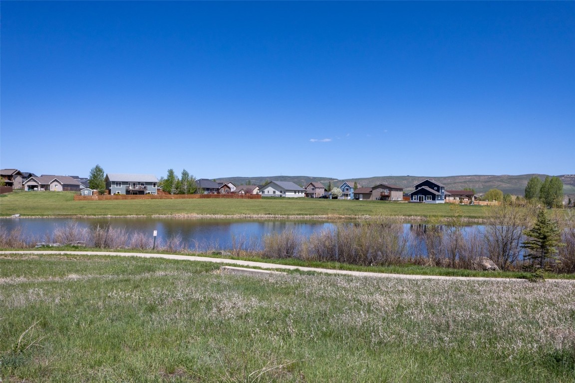 324 Little Bend Road Hayden, CO 81639 - Photo 34 of 35 a view of a lake with a yard