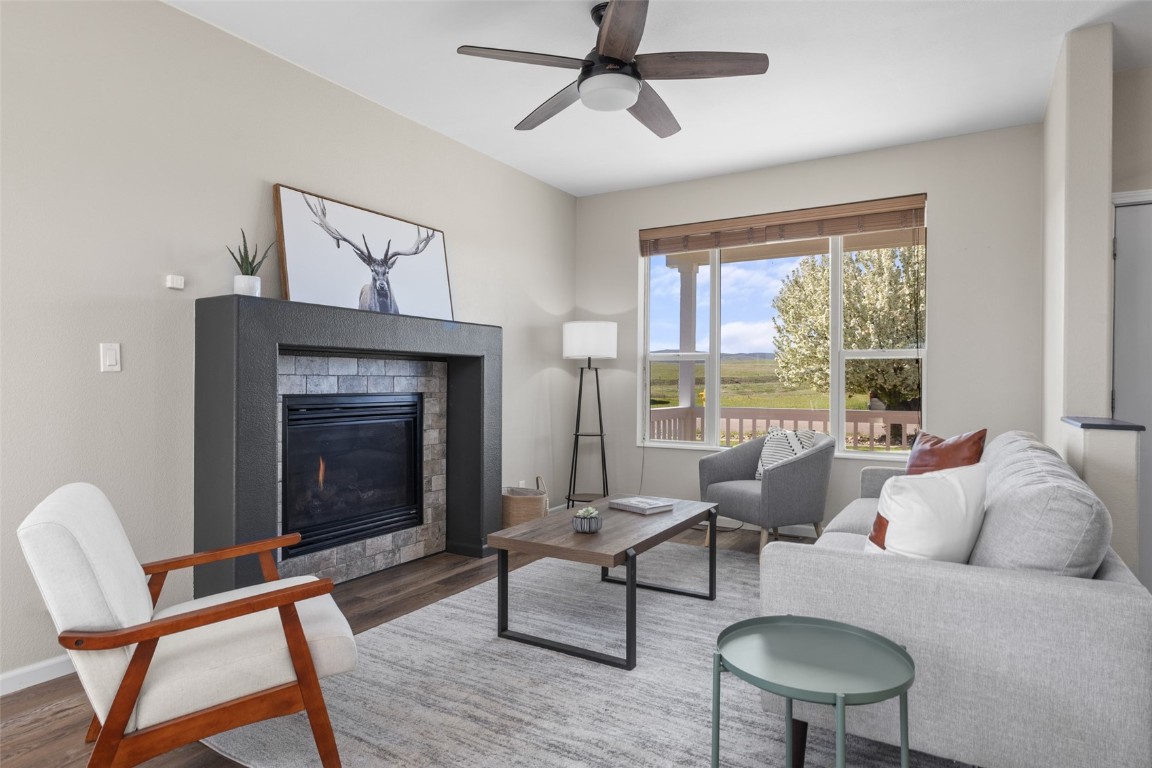 324 Little Bend Road Hayden, CO 81639 - Photo 4 of 35 a living room with furniture and a fireplace