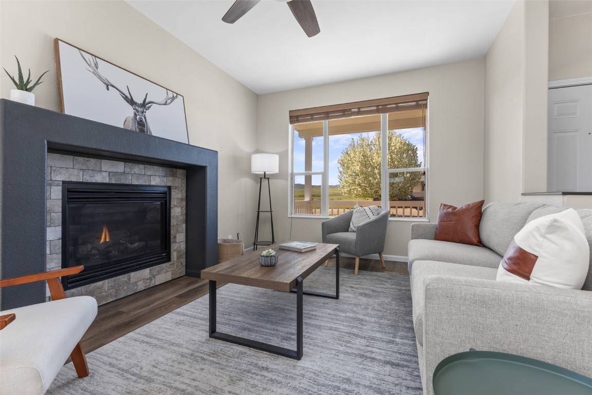 324 Little Bend Road Hayden, CO 81639 - Photo 5 of 35 a living room with furniture and a fireplace