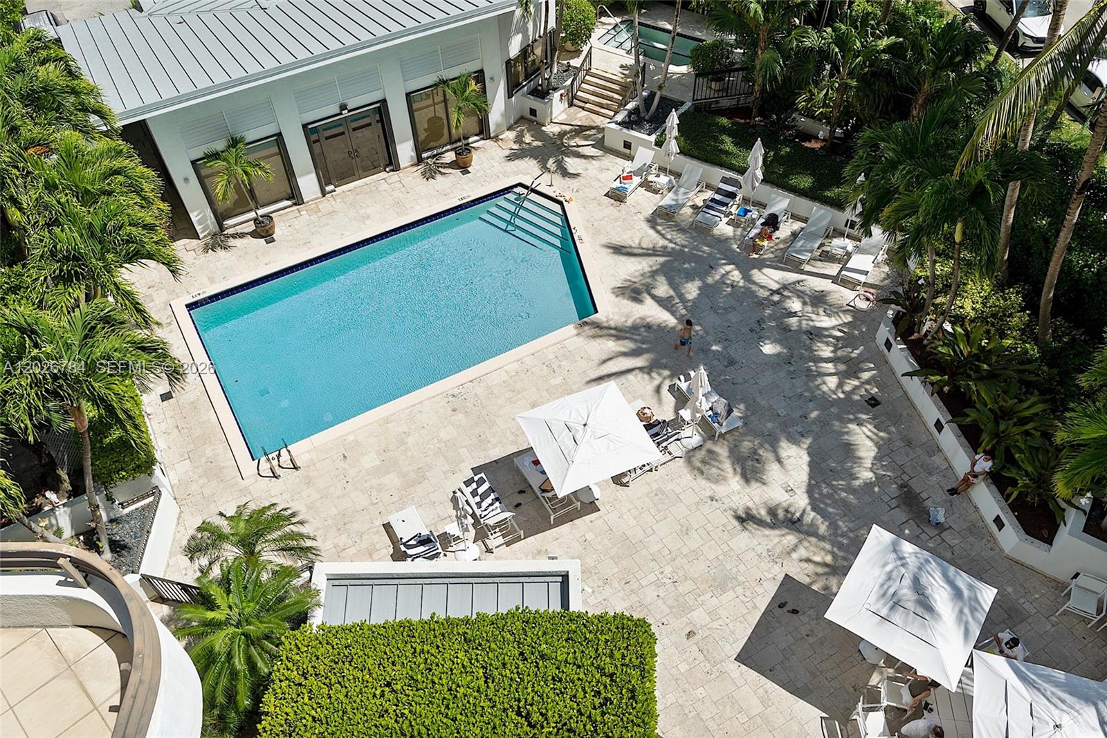 151 Southeast 15th Road, Unit 601 Miami, FL 33129 - Photo 36 of 36 an aerial view of a house with a yard