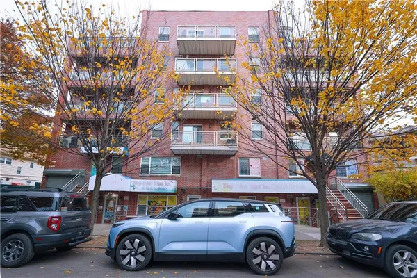 a car parked in front of a building