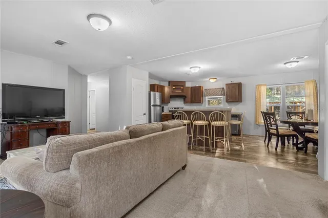 a view of a dining room with furniture