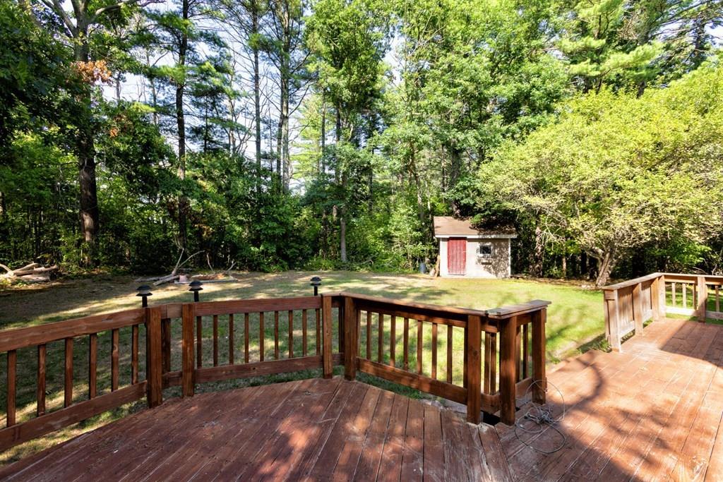 57 Christopher Road Rowley, MA 01969 - Photo 16 of 19 a balcony with trees in front of it