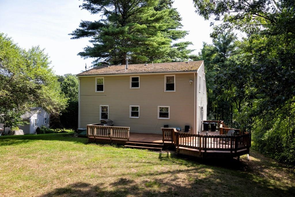 57 Christopher Road Rowley, MA 01969 - Photo 18 of 19 a view of a house with backyard and sitting area