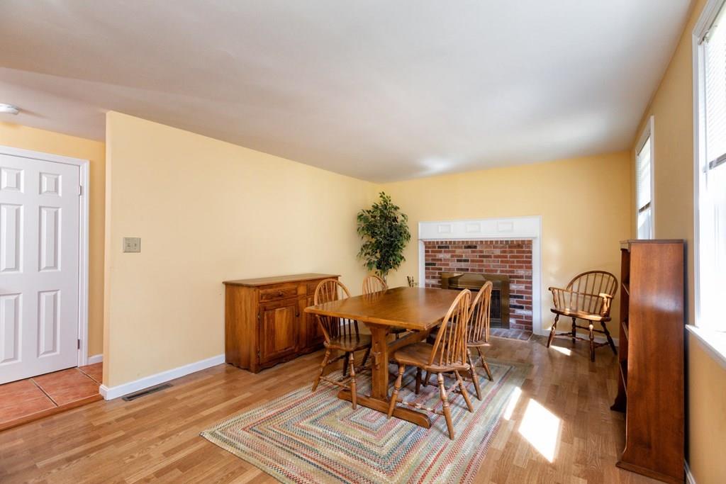 57 Christopher Road Rowley, MA 01969 - Photo 8 of 19 a dining room with furniture and wooden floor