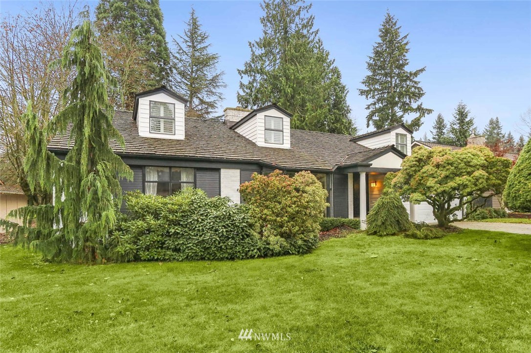 14811 Southeast 172nd Place Renton, WA 98058 - Photo 1 of 24 a front view of a house with a yard