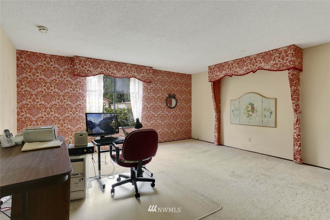 14811 Southeast 172nd Place Renton, WA 98058 - Photo 13 of 24 a workspace with furniture and window