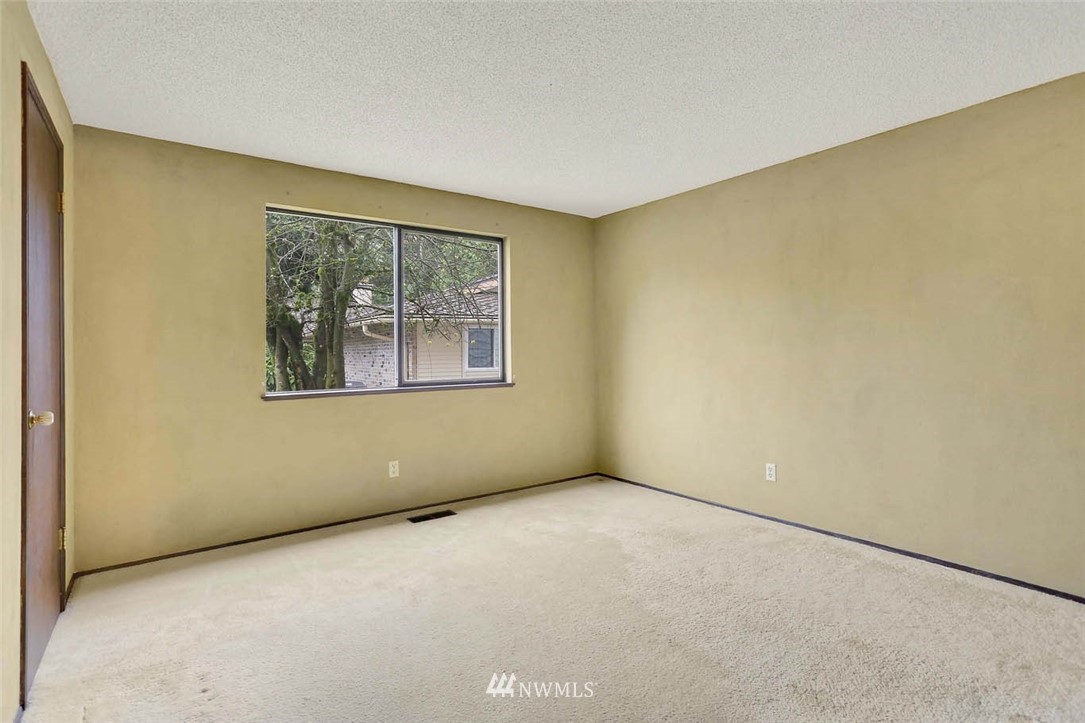 14811 Southeast 172nd Place Renton, WA 98058 - Photo 14 of 24 an empty room with a window
