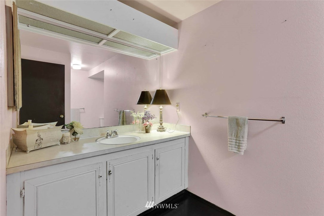 14811 Southeast 172nd Place Renton, WA 98058 - Photo 15 of 24 a bathroom with a double vanity sink and mirror