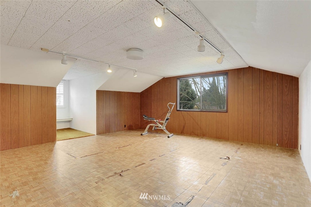14811 Southeast 172nd Place Renton, WA 98058 - Photo 18 of 24 a view of an empty room with windows